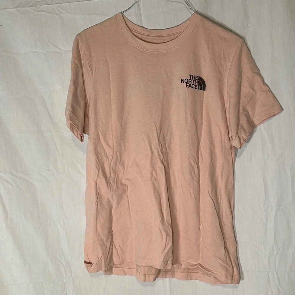 women’s peach The North Face “never stop exploring” tshirt size medium